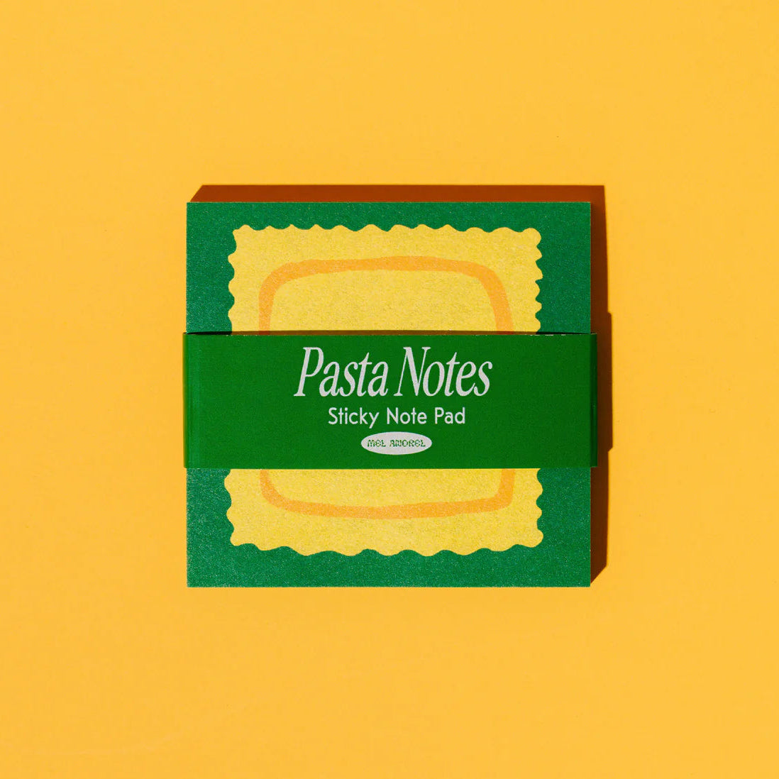 Pasta-shaped sticky notes in a green box on a yellow background