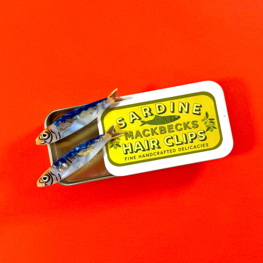 Sardine Hair Clips in Custom MackBecks Sardine Tin on Red Background