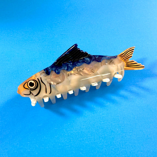 Sardine Hair Claw on blue background